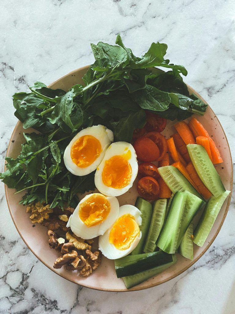 Healthy breakfast of eggs and vegetables promoting managing high cholesterol nutrition in Richmond